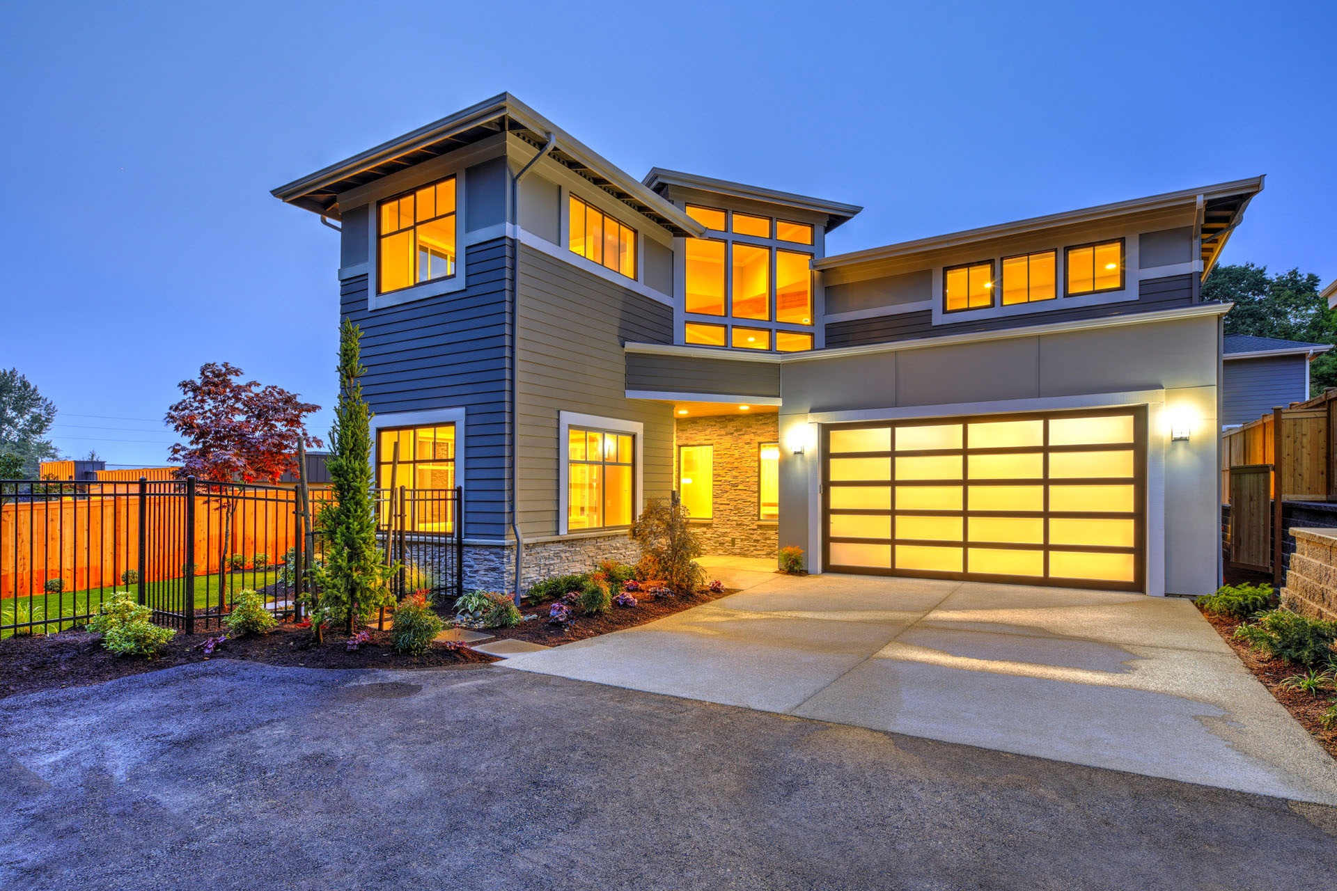 Modern home exterior at dusk in Vernon, BC – inspected by Interior Home Inspections during a pre-listing home inspection.